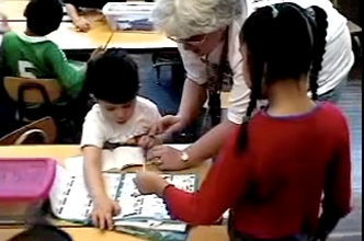 Video thumbnail for Tanya teaching an inclusive bilingual 1st grade class.